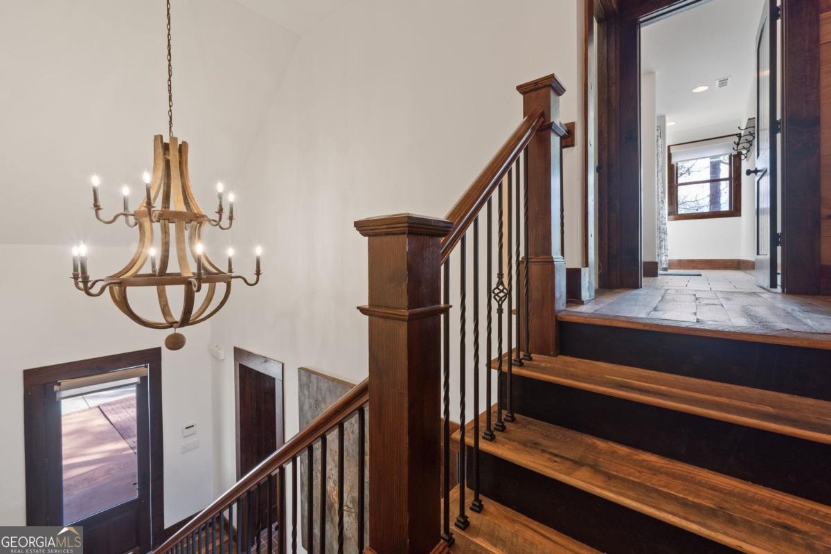 4096 Big Water E Road Sparta, GA 31087 - Photo 42 of 72 a view of entryway and hall with wooden floor