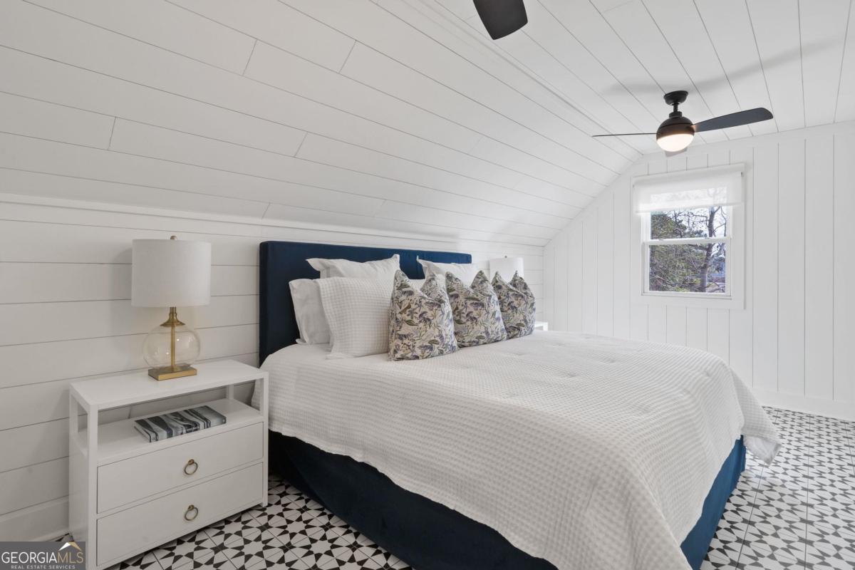 4096 Big Water E Road Sparta, GA 31087 - Photo 50 of 72 a bedroom with a bed and a dresser