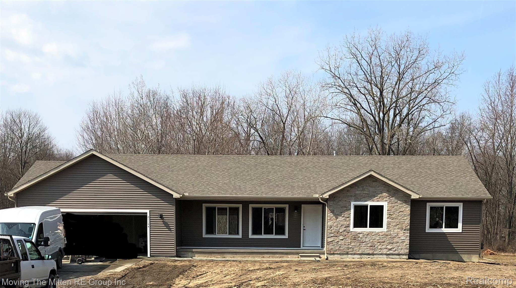 48644 Willow Road Belleville, MI 48111 - Photo 1 of 11 This is an example of what the home may look like-Front entrance garage