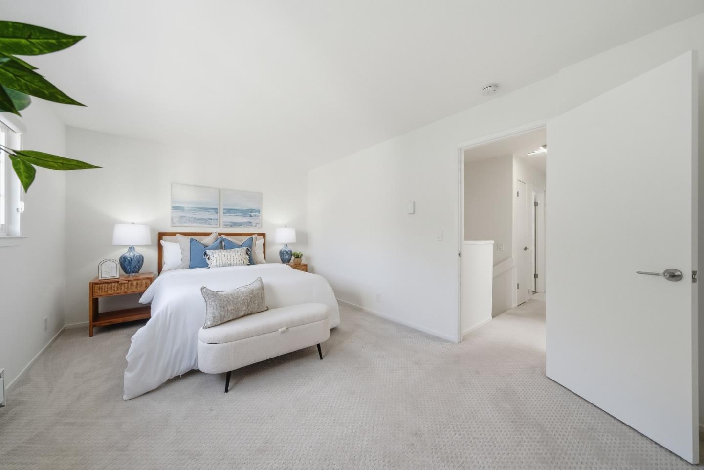 495 Ebken Street Pacifica, CA 94044 - Photo 30 of 52 a bedroom with a bed and a night stand
