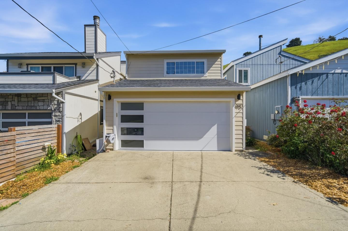 495 Ebken Street Pacifica, CA 94044 - Photo 3 of 52 a view of a house with a garage