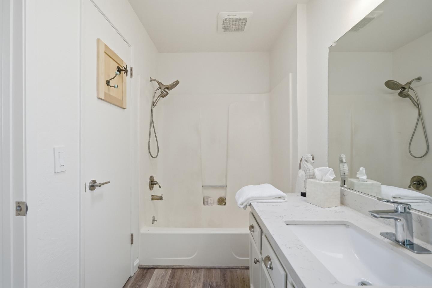 495 Ebken Street Pacifica, CA 94044 - Photo 39 of 52 a bathroom with a sink a toilet and shower