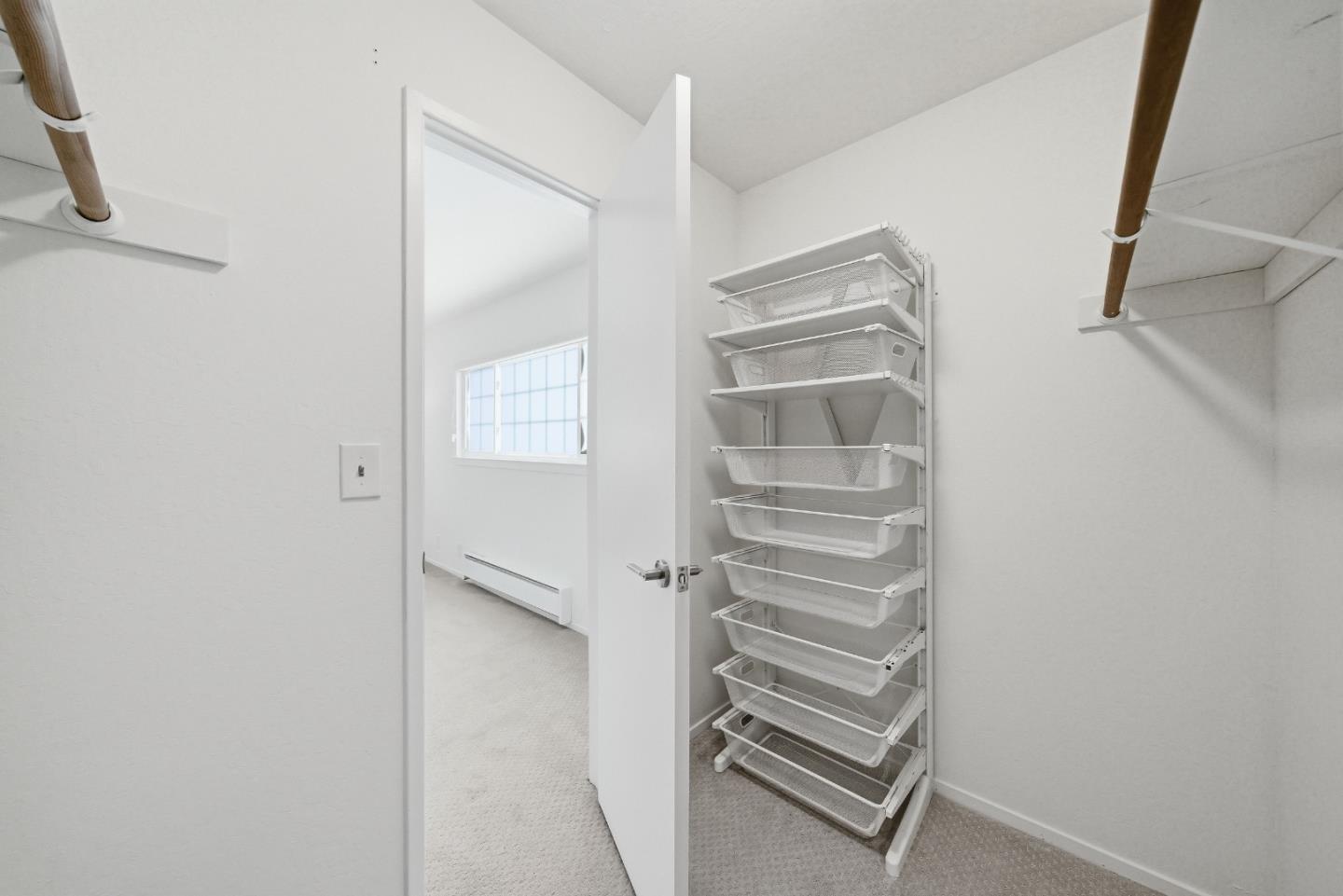 495 Ebken Street Pacifica, CA 94044 - Photo 42 of 52 a view of walk in closet with empty racks