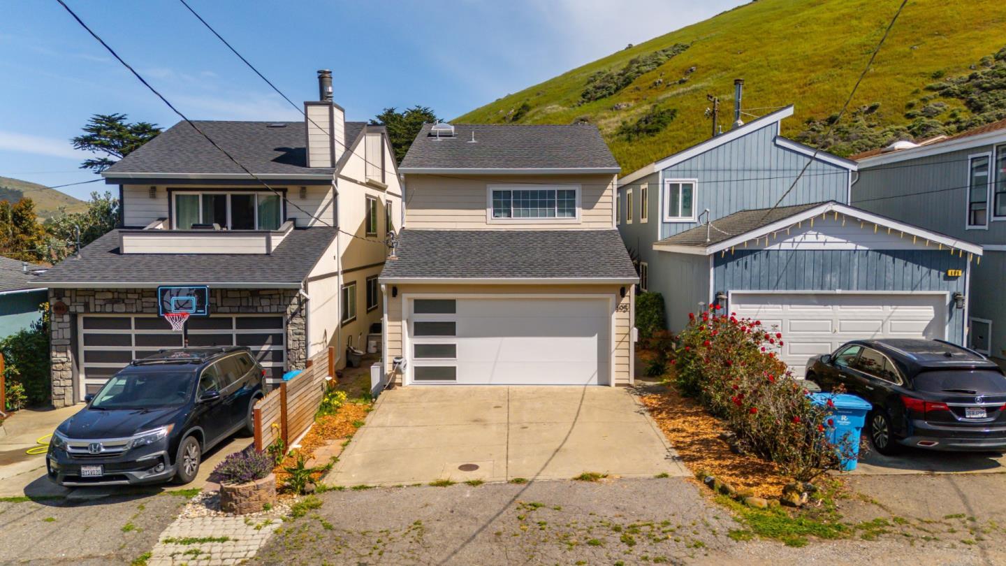 495 Ebken Street Pacifica, CA 94044 - Photo 48 of 52 a front view of a house with parking space