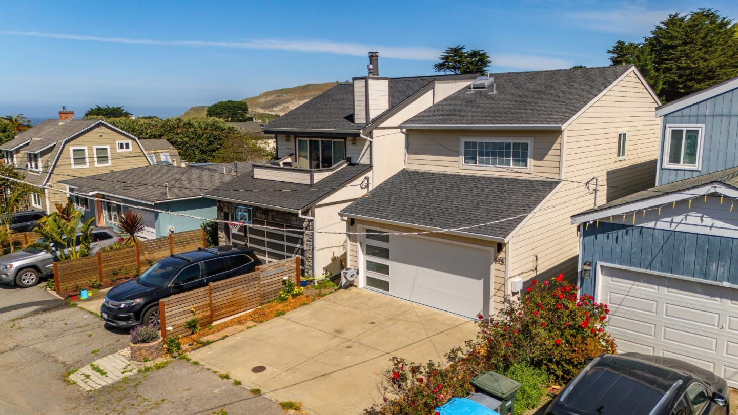 495 Ebken Street Pacifica, CA 94044 - Photo 49 of 52 a aerial view of a house with a garage