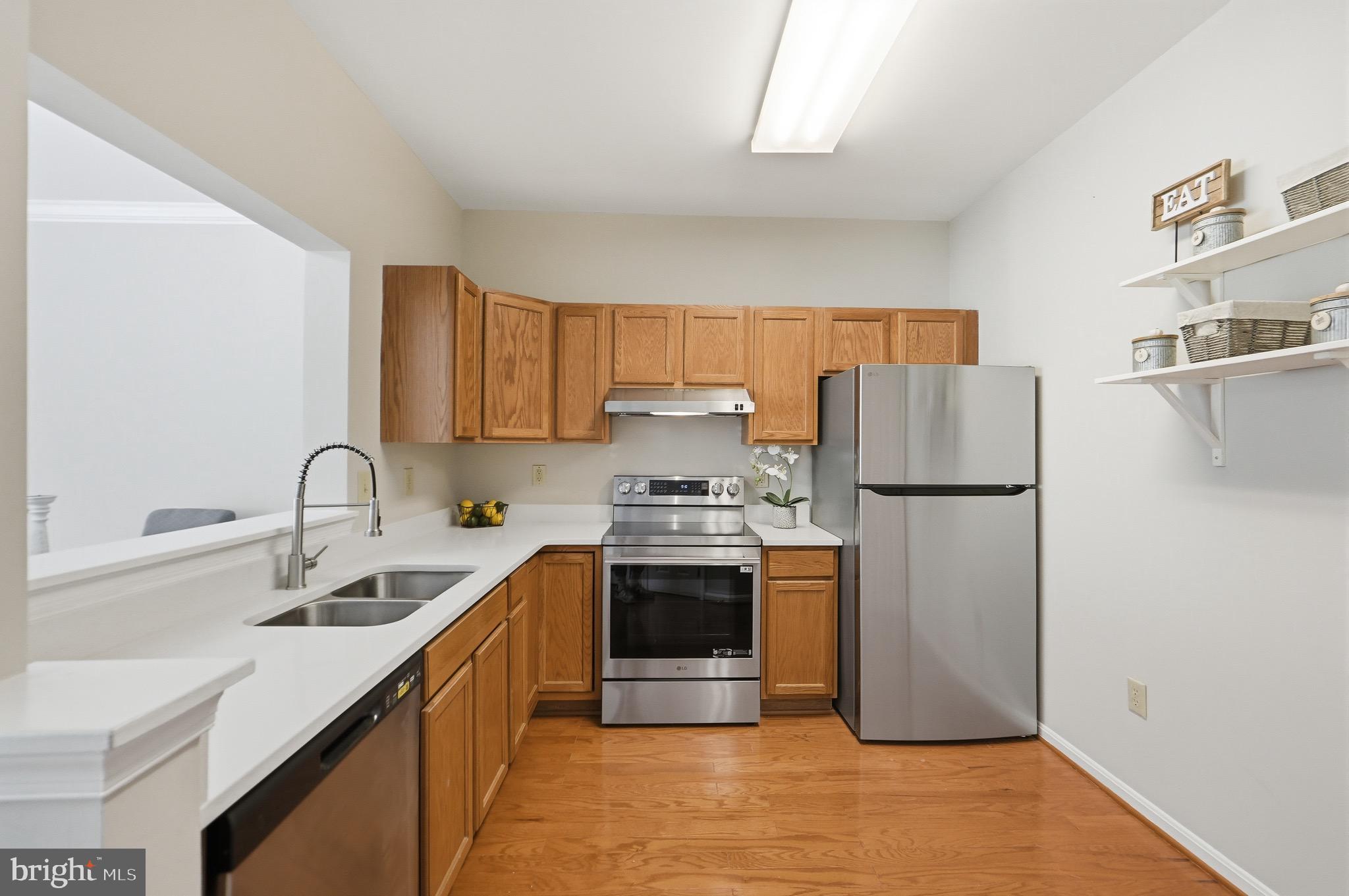 2002 Bell Point Court Odenton, MD 21113 - Photo 5 of 30 NEW quartz countertops + stainless appliances!
