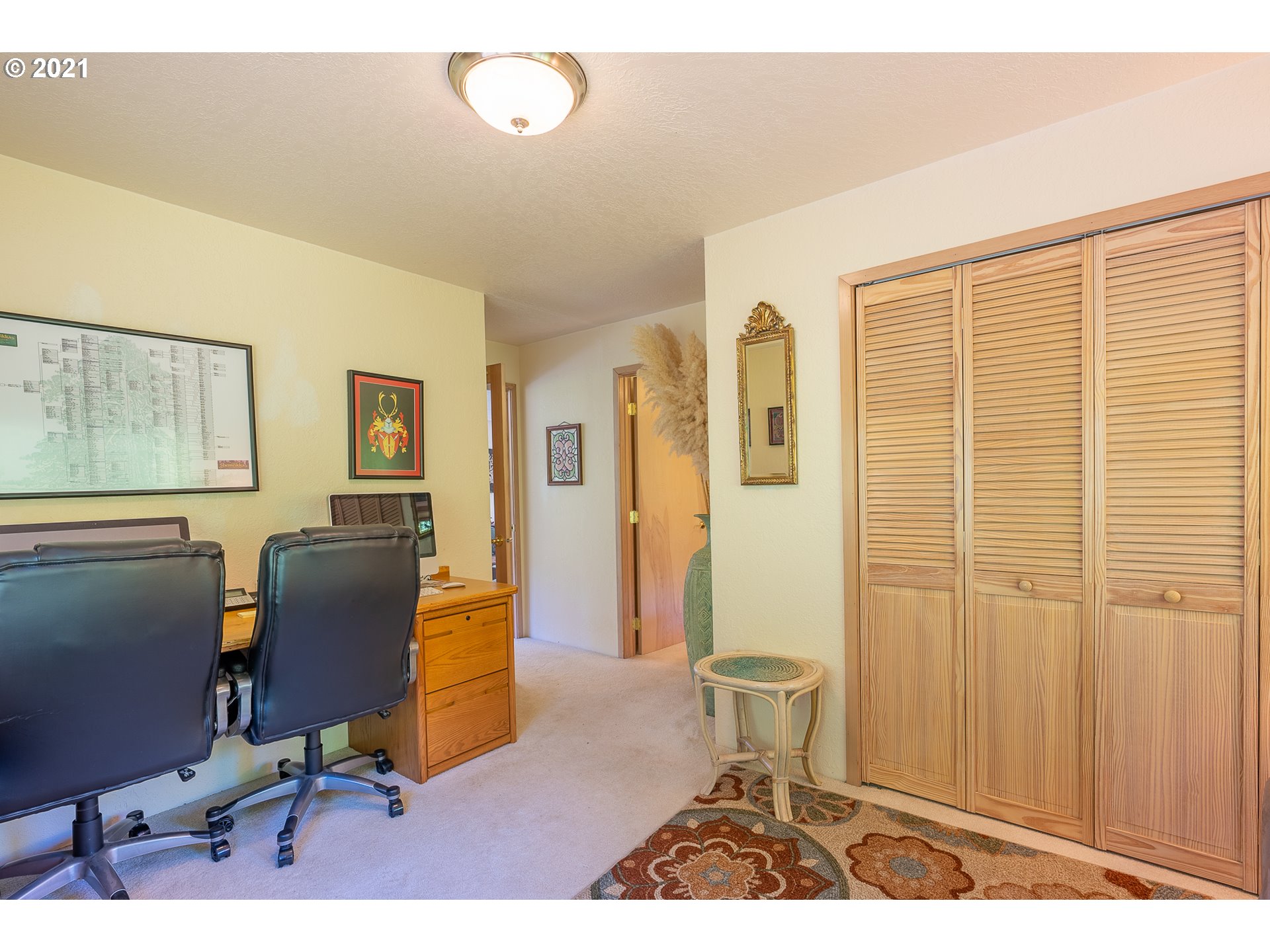 8715 Scholfield Road North Bend, OR 97459 - Photo 14 of 32 a living room with furniture and a window