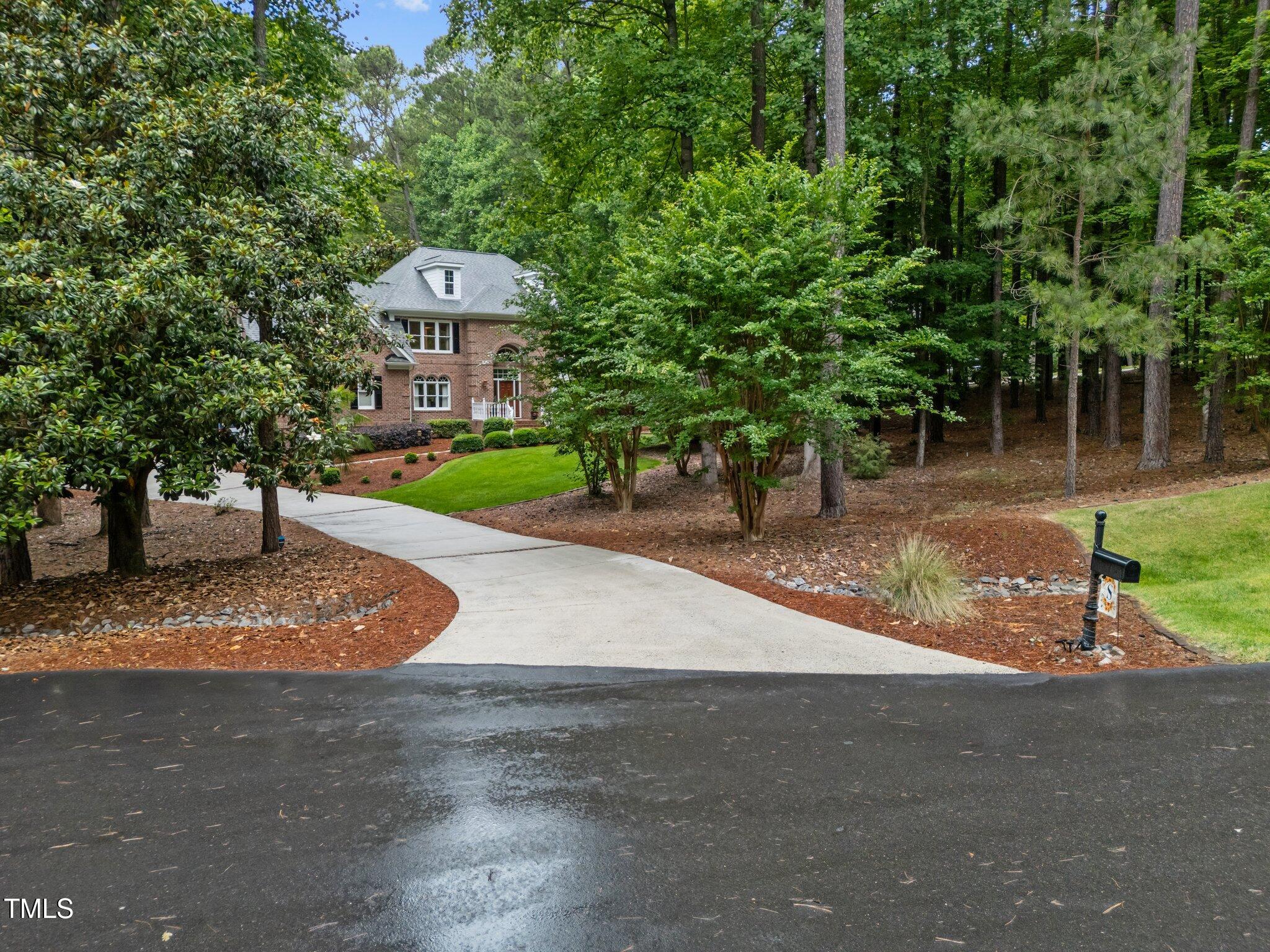 5805 Laurel Rock Lane Raleigh, NC 27613 - Photo 4 of 41 42-web-or-mls-DJI_20250527094044_0933_D
