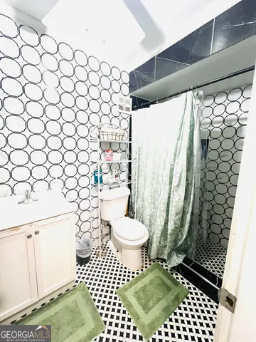 a view of a swimming pool with an outdoor seating