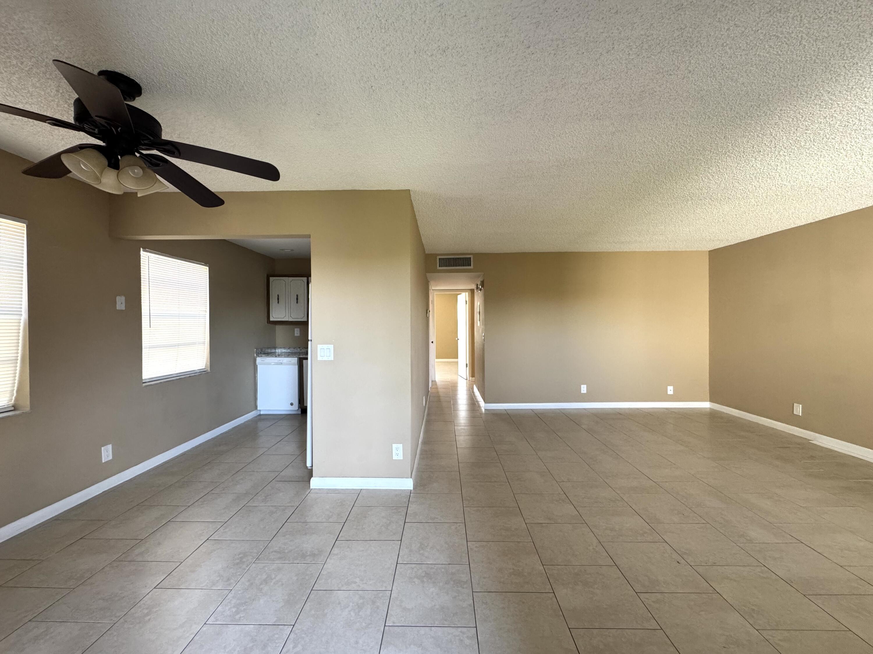 900 Normandy Lane Delray Beach, FL 33484 - Photo 2 of 22 a view of an empty room and window