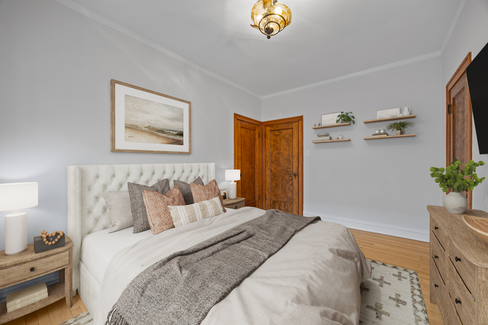 1352 East Madison Park, Unit 2 Chicago, IL 60615 - Photo 13 of 17 a bedroom with bed and furniture