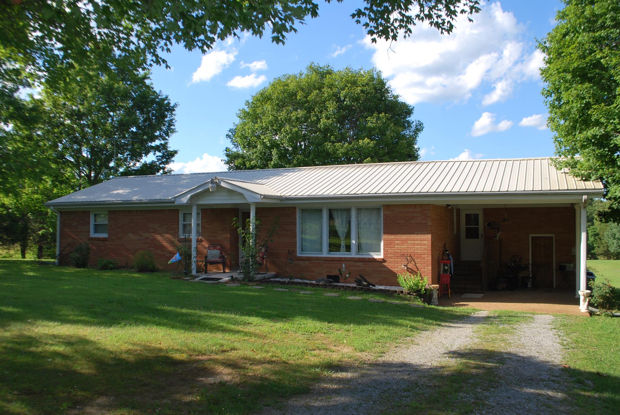 180 Sam Hollow Road Dickson, TN 37055 - Photo 1 of 18 a view of a house with a yard