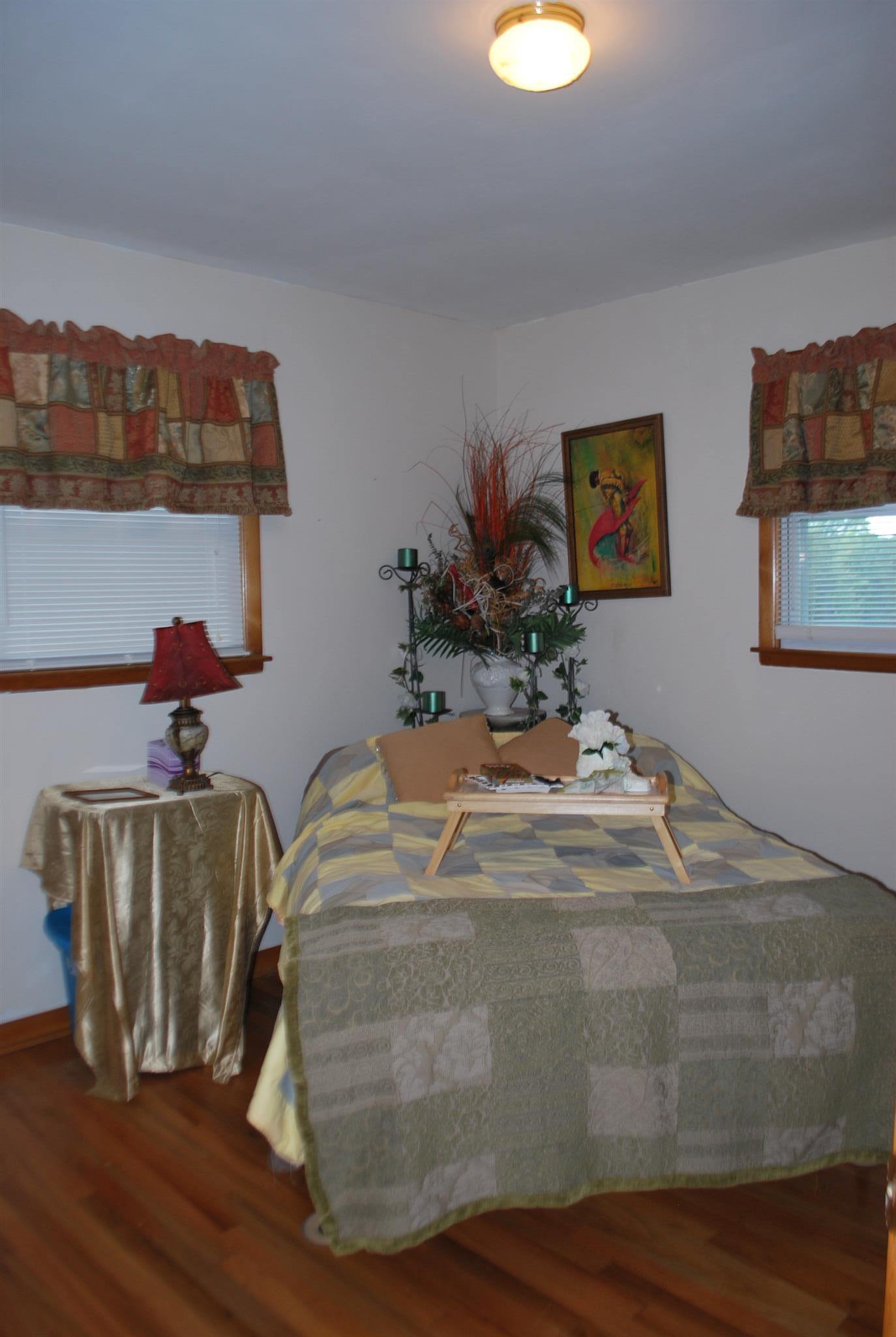 180 Sam Hollow Road Dickson, TN 37055 - Photo 8 of 18 a room with two couches and painting on the wall