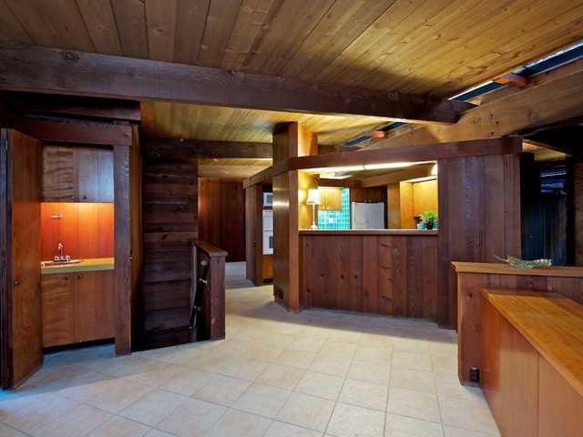 10087 Shadow Road La Mesa, CA 91941 - Photo 11 of 25 Wet bar and sccess via these stairs to 4th bedroom/office and garae