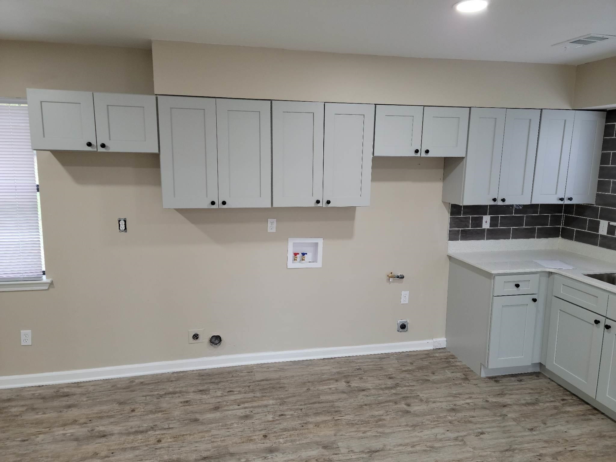 3437 Tallyho Road Memphis, TN 38128 - Photo 8 of 22 a view of cabinets and wooden floor