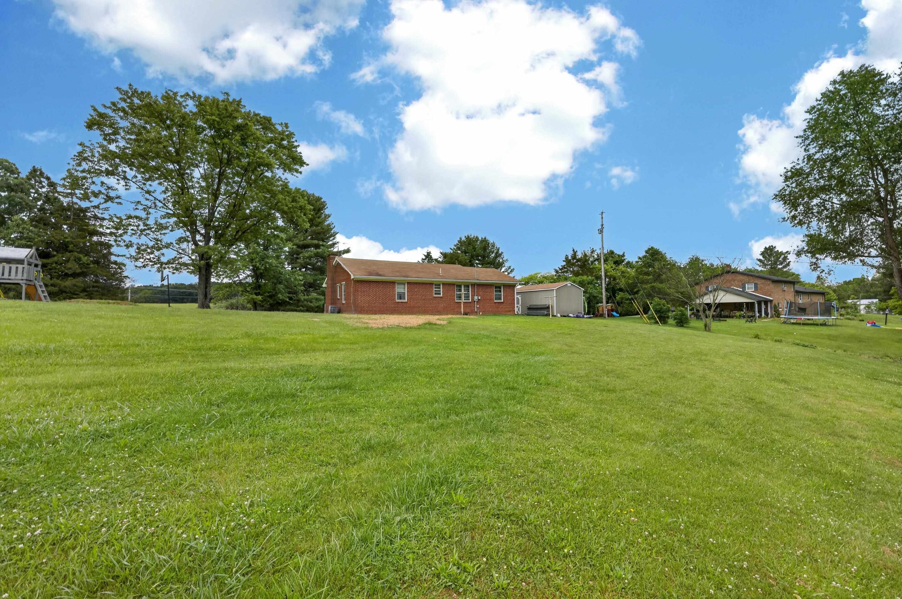 7827 Lee Highway Raphine, VA 24472 - Photo 46 of 62 a view of a house with a backyard