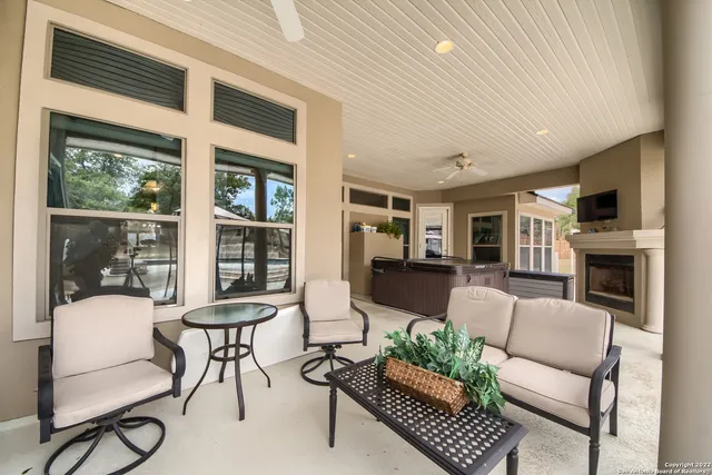 a living room with furniture and a window