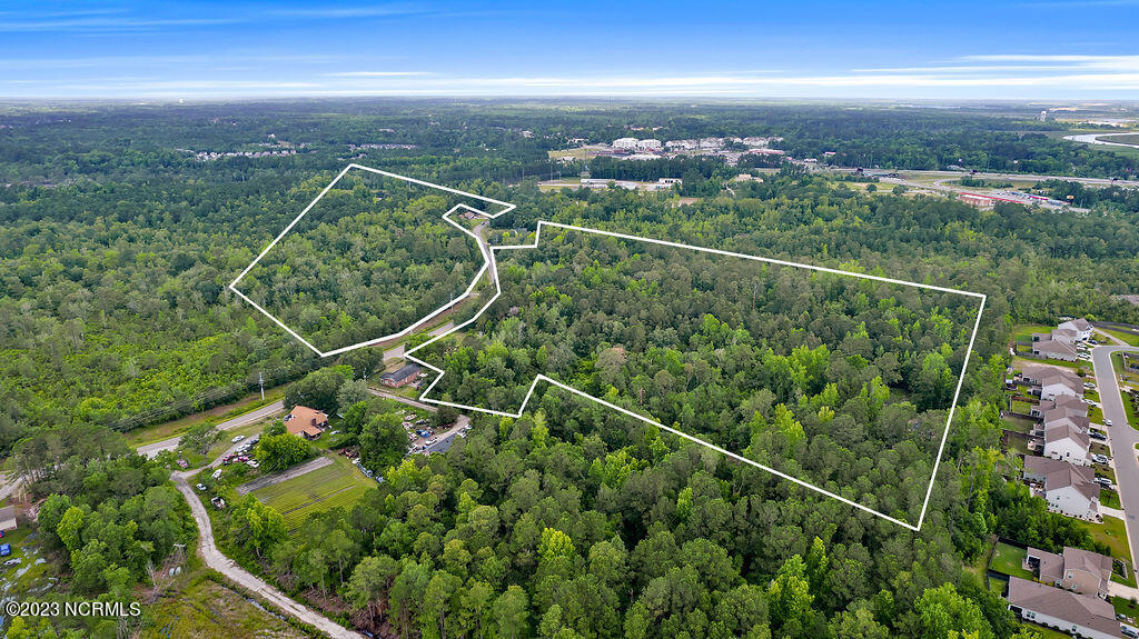 10295 Chappell Loop Road Southeast Belville, NC 28451 - Photo 1 of 25 10295ChappellLoopRoadSEAerial-9