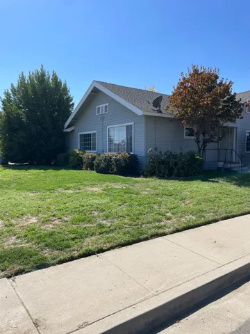 a house view with a outdoor space