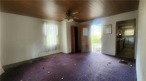 140 High Street Avonmore, PA 15618 - Photo 4 of 19 an empty room with windows and closet