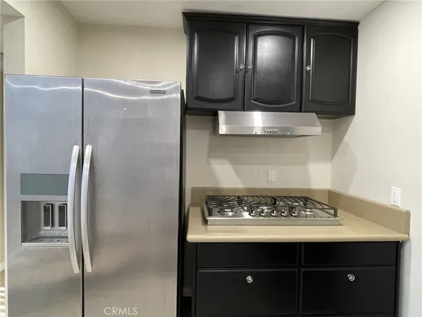 a view of kitchen island with wooden floor