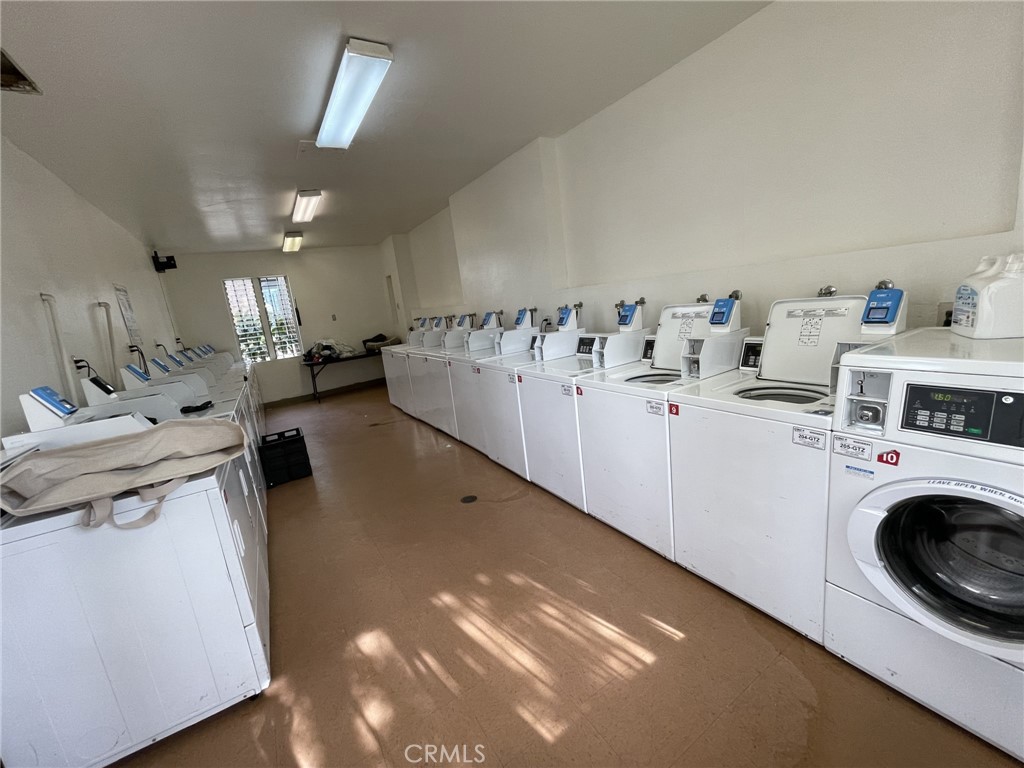 5700 Etiwanda Avenue, Unit 240 Los Angeles, CA 91356 - Photo 38 of 39 a view of kitchen sink washer and dryer