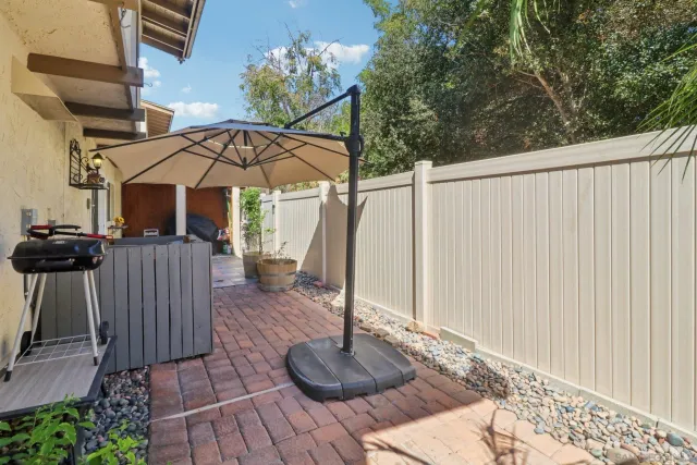 a view of a porch with seating space
