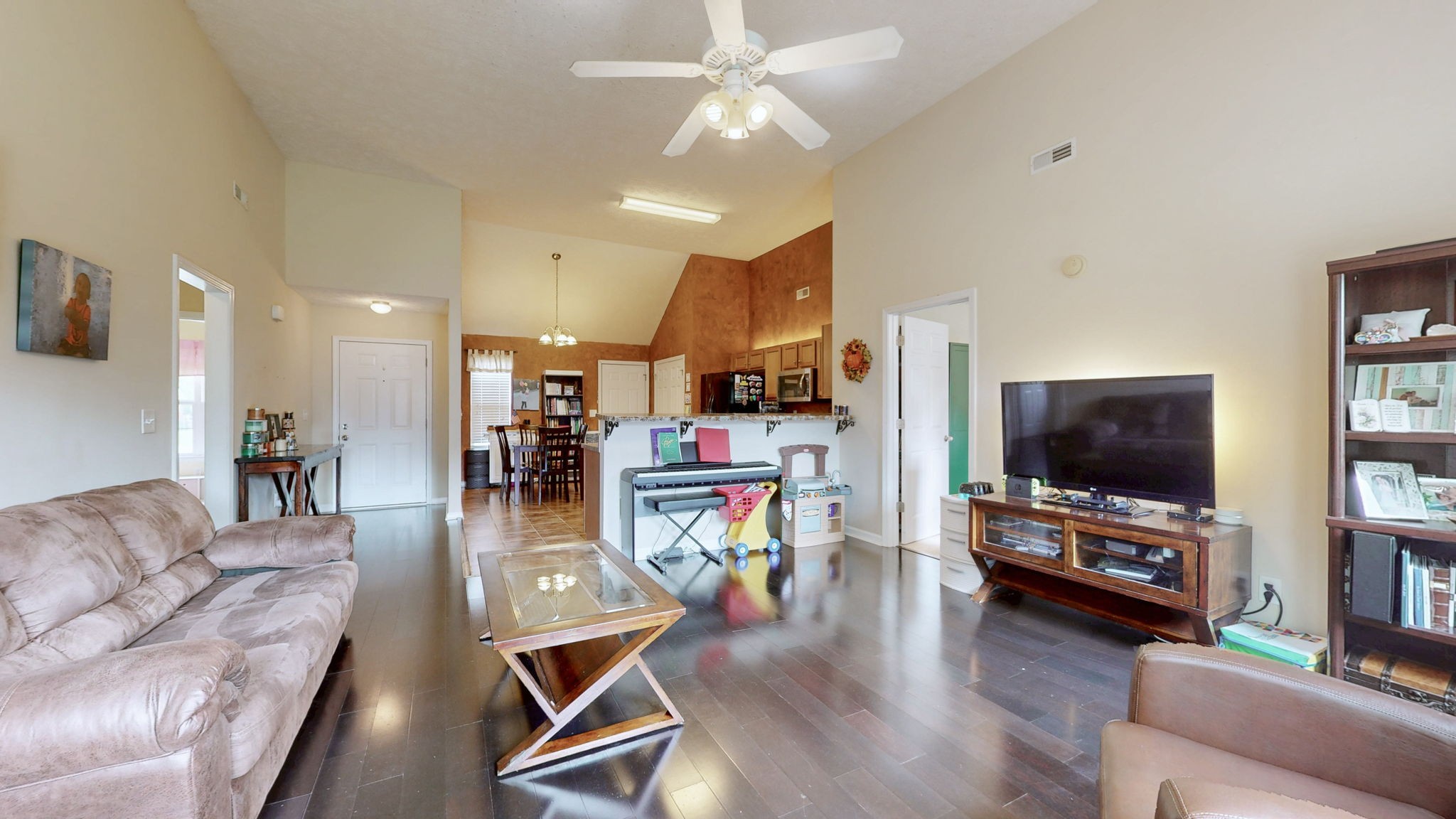 2822 Ridgewood Drive Christiana, TN 37037 - Photo 2 of 39 a living room with furniture and a flat screen tv