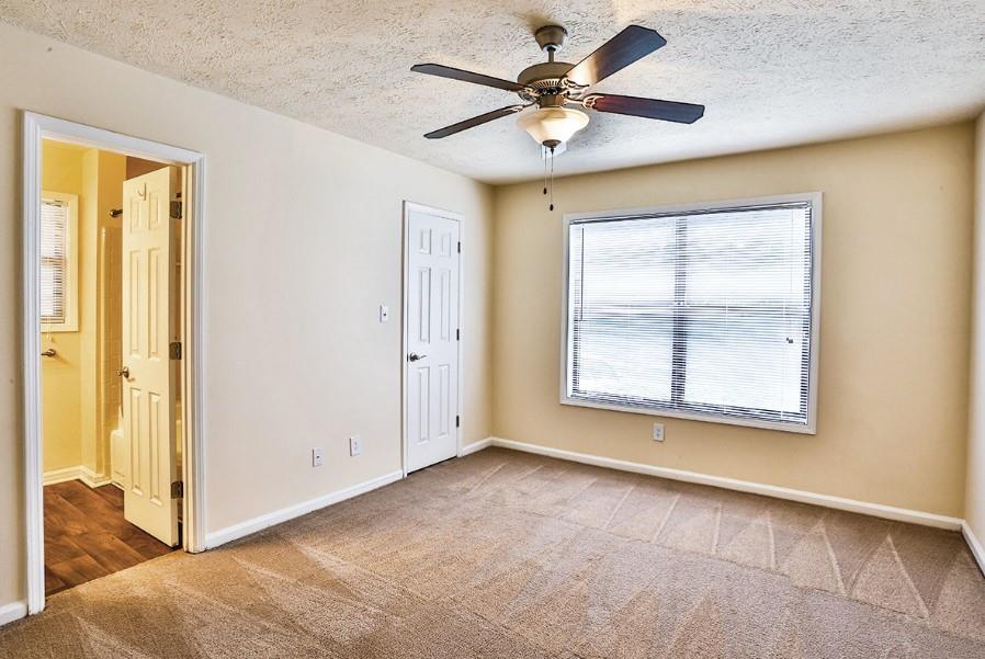 3450 K Jones Mill Road, Unit 218 Norcross, GA 30092 - Photo 11 of 29 a view of an empty room with a window