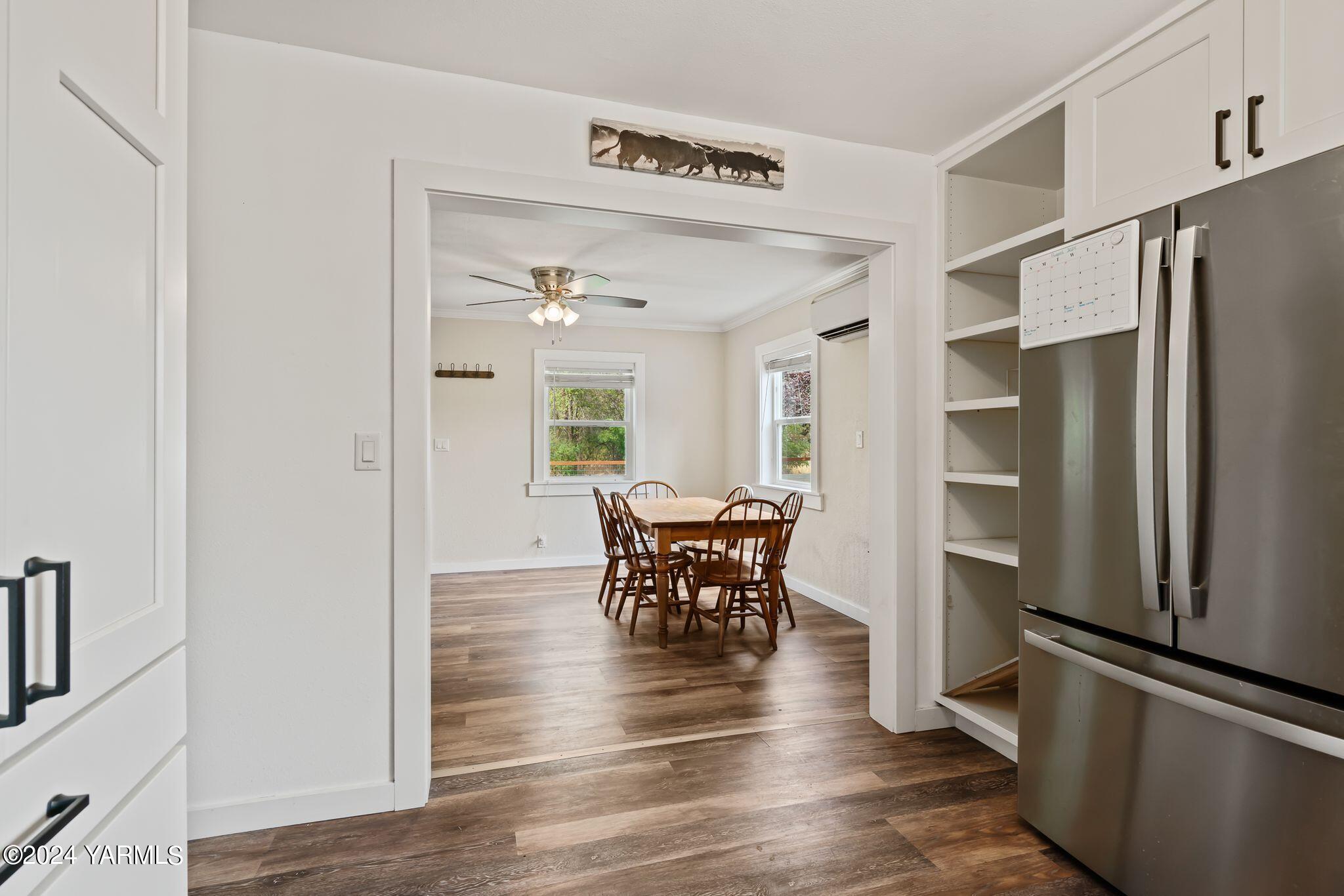 30 Craig Road Naches, WA 98937 - Photo 9 of 21 a view of a kitchen with refrigerator and wooden floor