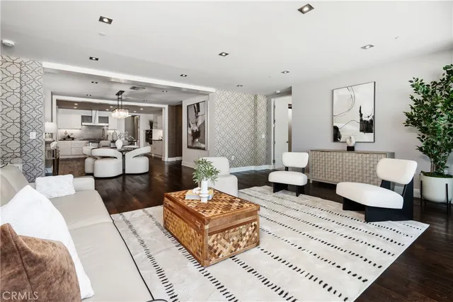 a living room with furniture and a rug