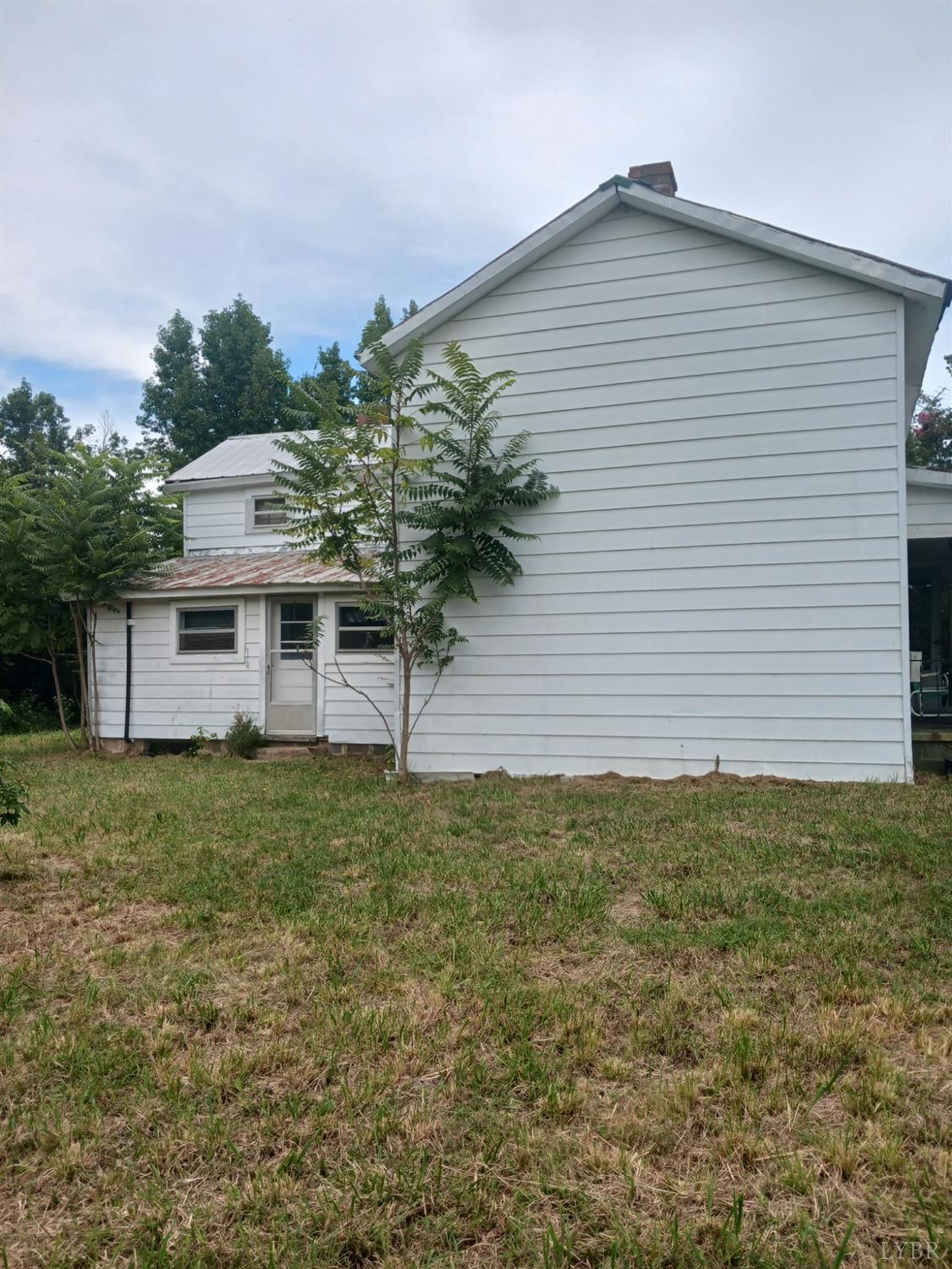 6301 Straightstone Road Long Island, VA 24569 - Photo 15 of 17 a view of a house with a yard