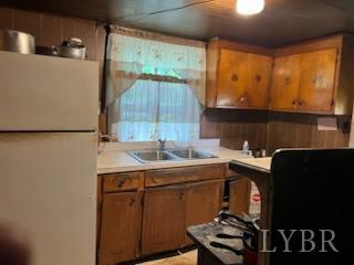 6301 Straightstone Road Long Island, VA 24569 - Photo 5 of 17 a kitchen with a sink and cabinets