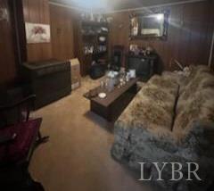 6301 Straightstone Road Long Island, VA 24569 - Photo 7 of 17 a living room with furniture