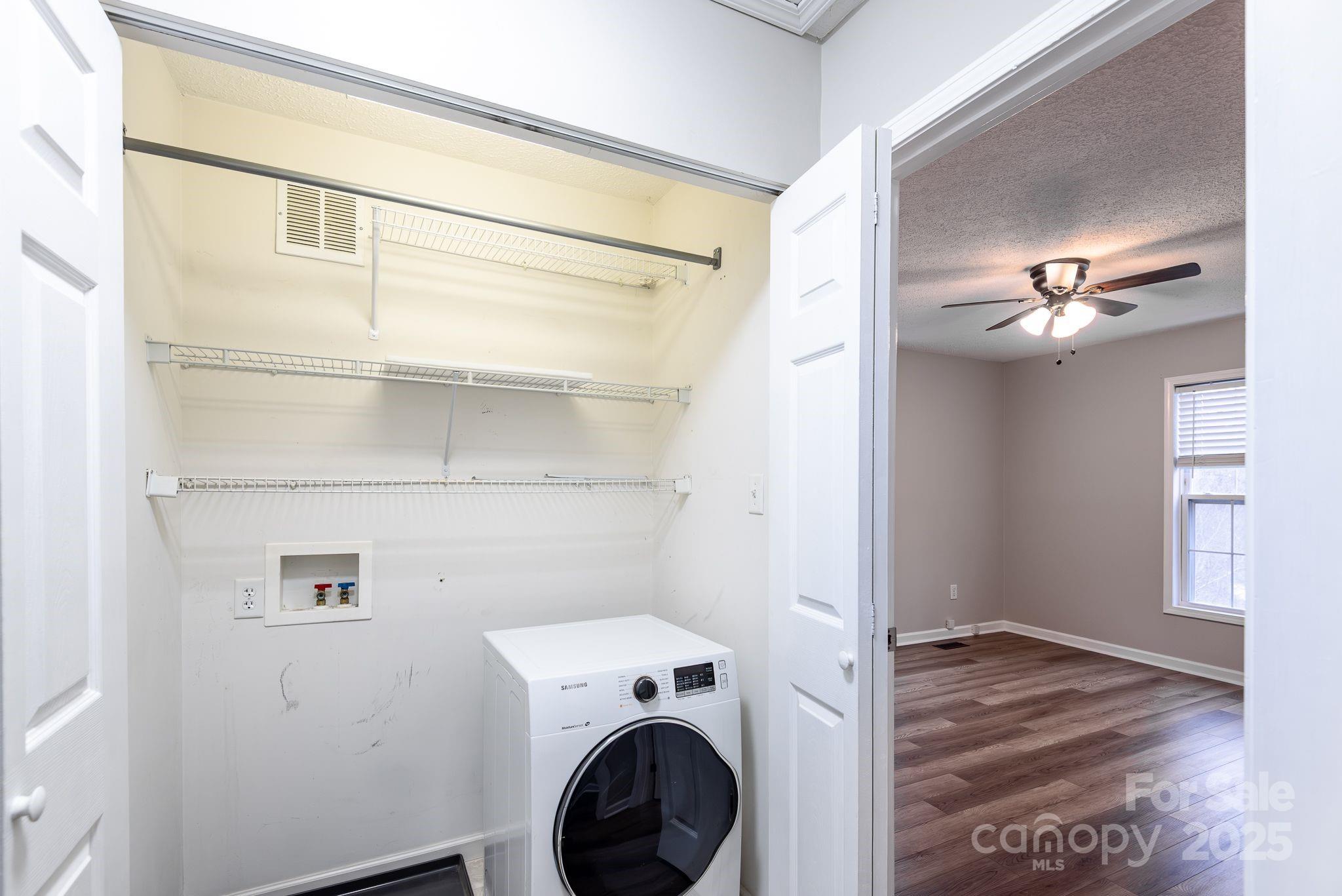 263 Newberry Drive Fletcher, NC 28732 - Photo 12 of 29 a view of a storage & utility room with closet dryer