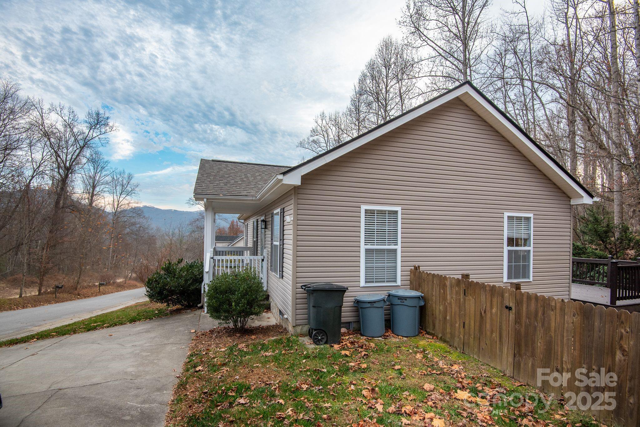 263 Newberry Drive Fletcher, NC 28732 - Photo 28 of 29 a view of a house with a yard