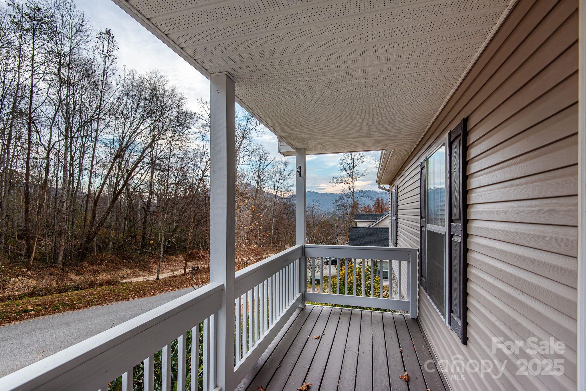 263 Newberry Drive Fletcher, NC 28732 - Photo 3 of 29 a view of a balcony with wooden floor