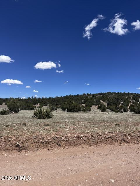 Lot 15 Juniper Mtn Ranches, Unit 15 Seligman, AZ 86337 - Photo 6 of 13 a view of a lake with sunset
