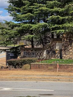 a view of a house with a street