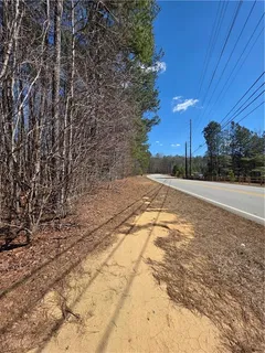 a view of an empty space and basketball court