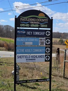 a sign on the side of the road