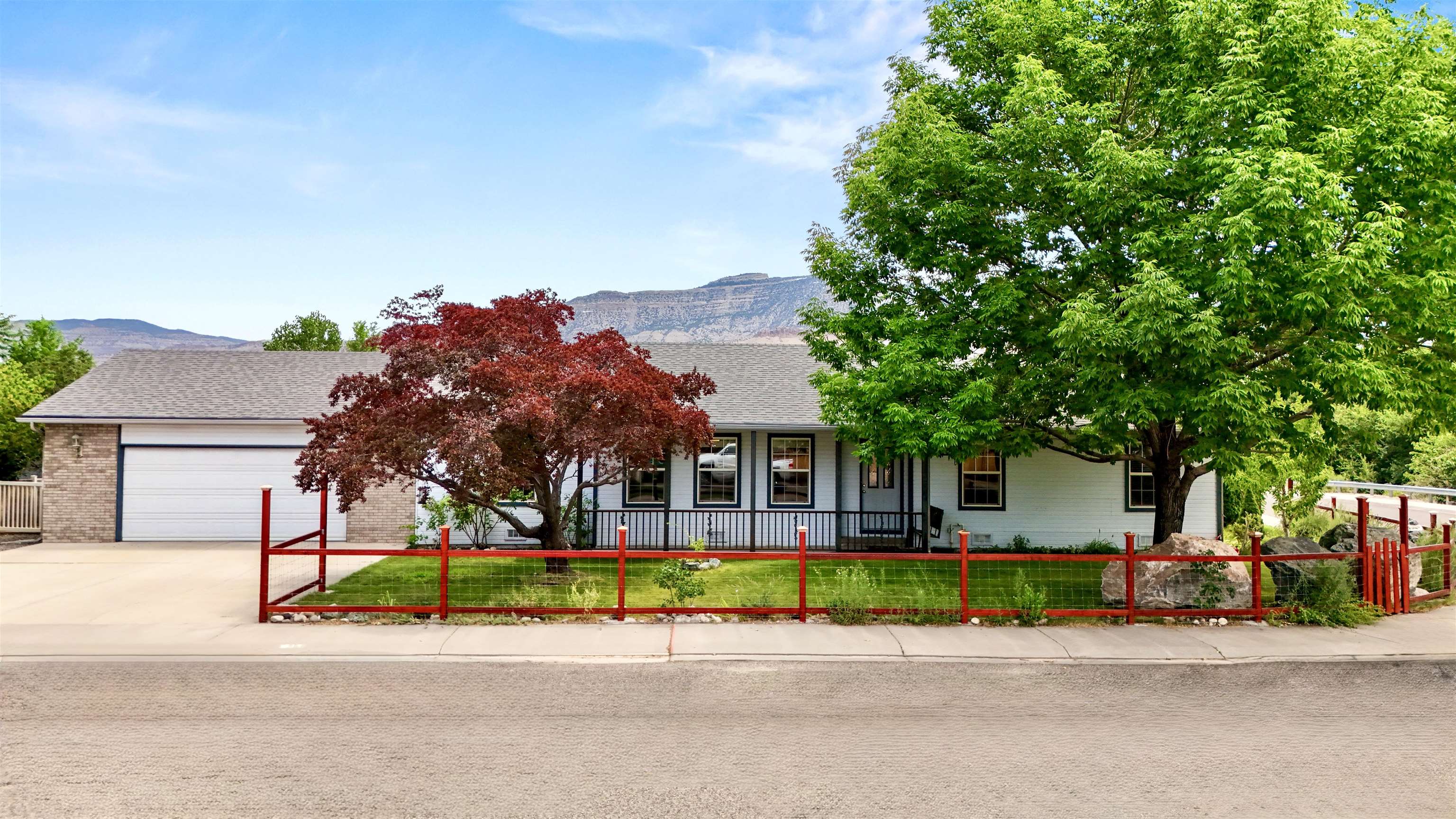 819 Elberta Avenue Palisade, CO 81526 - Photo 32 of 40 a view of a house with a swimming pool