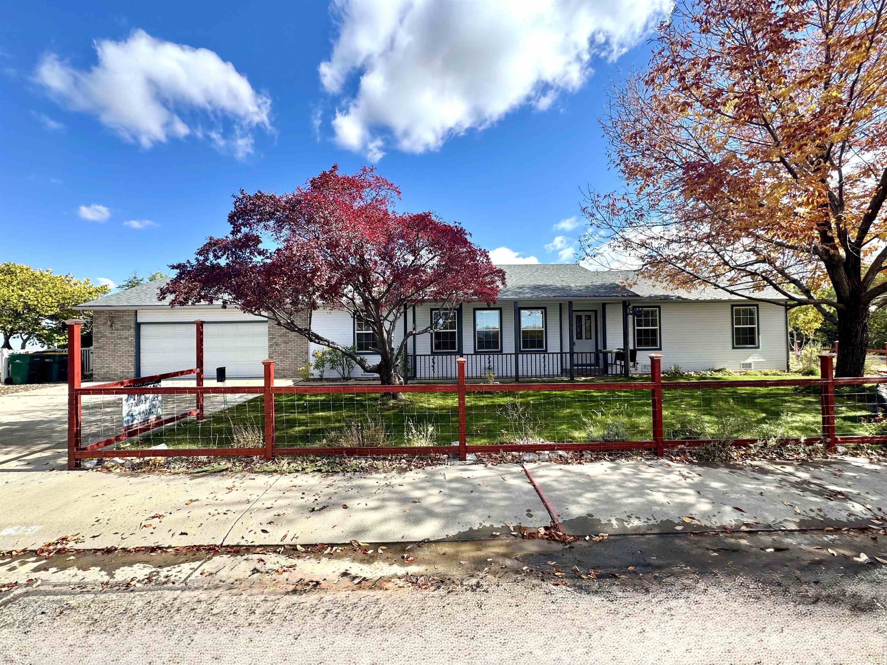 819 Elberta Avenue Palisade, CO 81526 - Photo 40 of 40 a view of a house with a yard