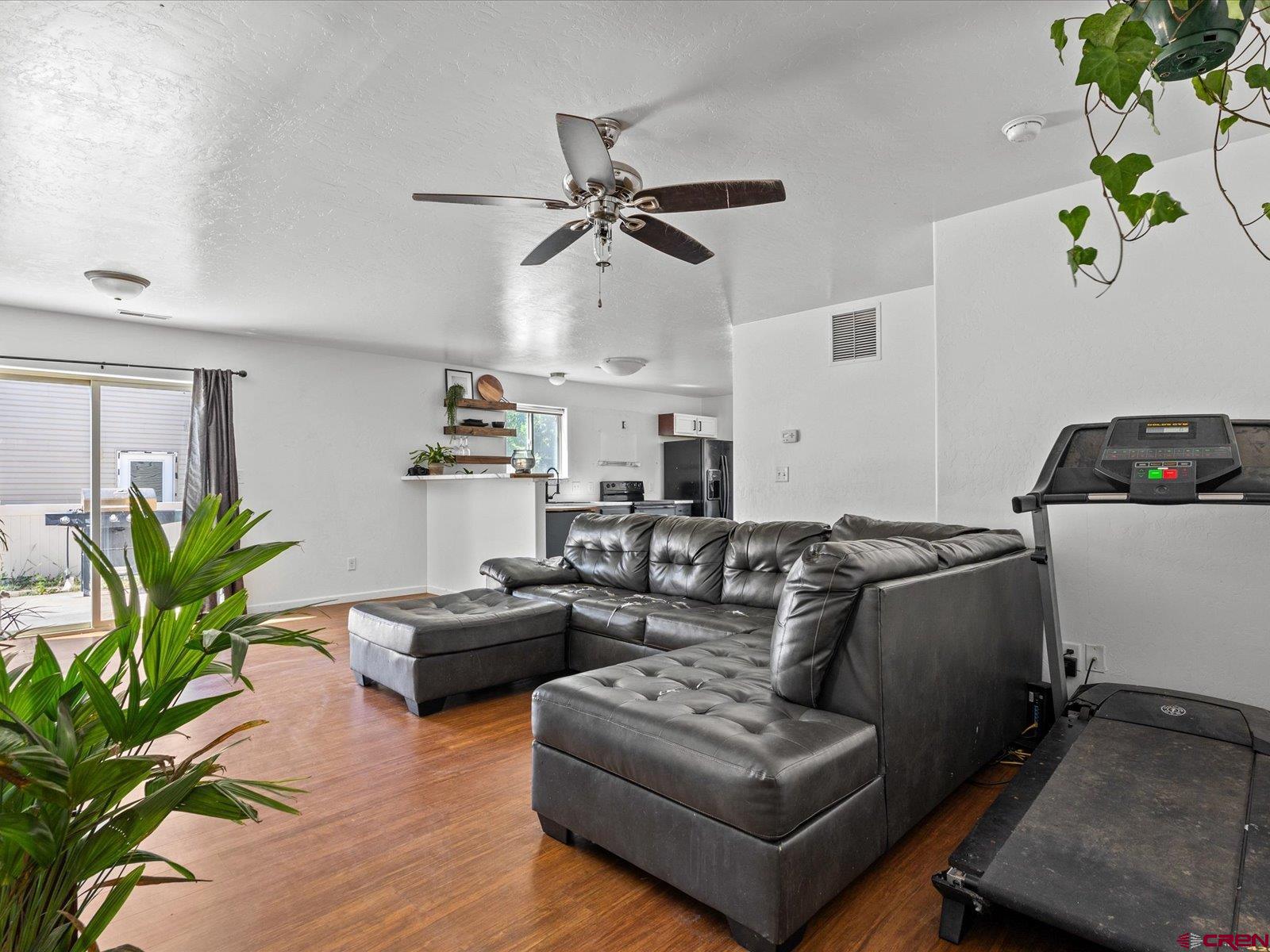 2473 Brookwillow Loop Grand Junction, CO 81505 - Photo 7 of 19 a living room with furniture and a window