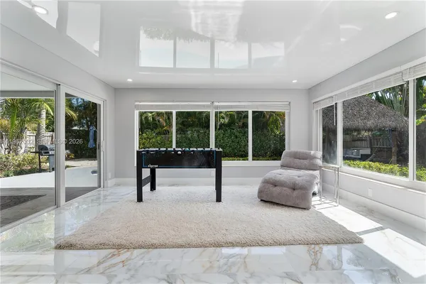 a bedroom with a bed and a night stand