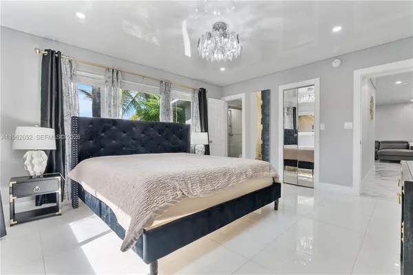 a bathroom with a shower a toilet and sink