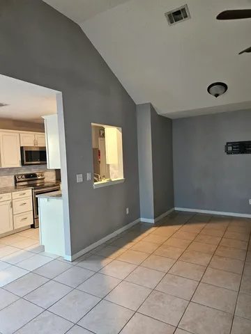 a view of kitchen with windows