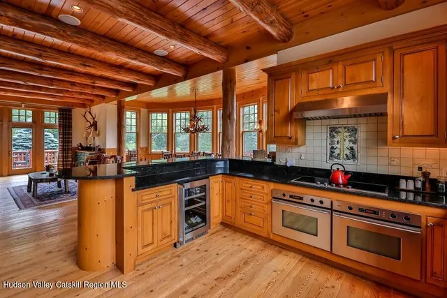 a view of a two chairs on the roof deck