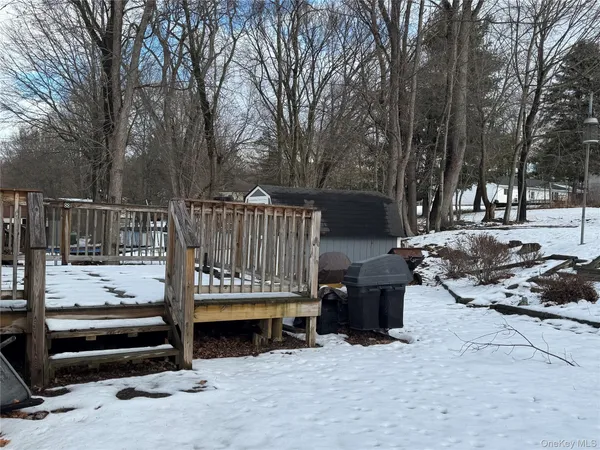 a view of a patio with a bench