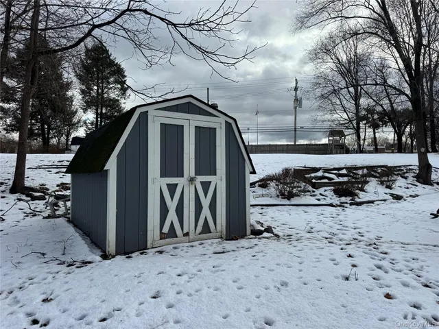 a view of a covered with snow in the background